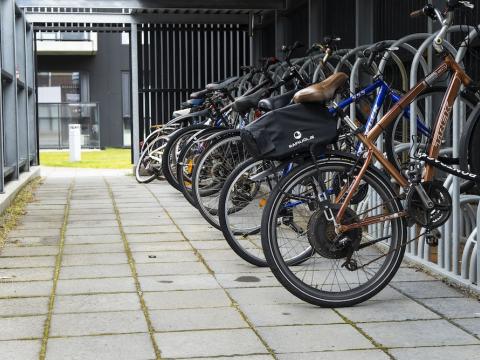 Bicycles inside a shelter.