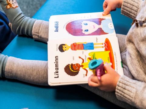 Child reading a book