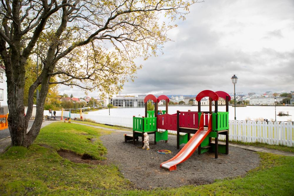 Playground castle and slide in the outdoor area at Tjörn preschool