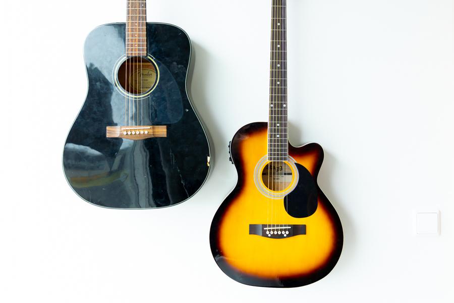 Guitars mounted on the wall. 