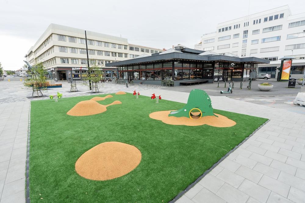 green playground by building