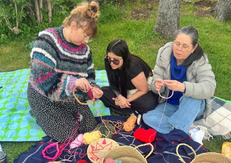 Knitting lessons in progress at Summer City