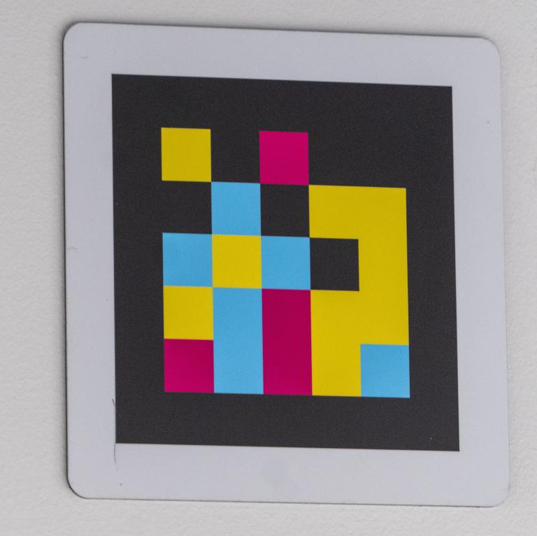 NaviLens code on the wall near the cafeteria in Reykjavík City Hall