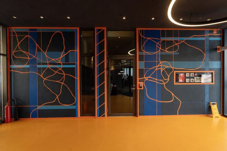 Artwork with orange stripes.