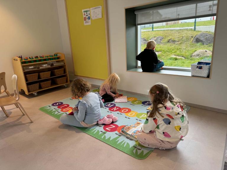 Children playing in Hulduheimar's new addition