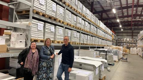 City staff with stacks of drawings