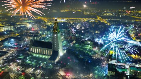 Fireworks. Aerial view of Hallgrímskirkja and surrounding areas.